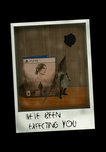 A screenshot from a mock-up advertisement for the game Silent Hill 2, featuring a Polaroid-style photo of a Pyramid Head figure in front of the game's box.